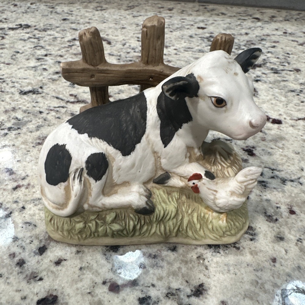 A Vintage Porcelain Homco Collectible Cow Sculpture No. 1469